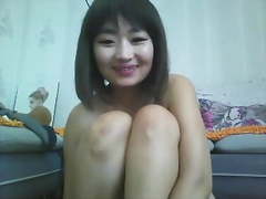 Adorable Chinese Camgirl Deepthroats Dildo